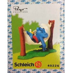 Figurine Schleich® Les Schtroumpfs Le Schtroumpf dans son hamac (40226)