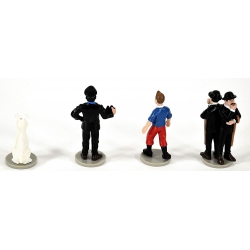 Set de 4 figuritas de colección Tintín, Milú, Haddock, Hernández y Fernández