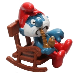 Figurine Schleich® Les Schtroumpfs Grand schtroumpf sur chaise à bascule (40228)